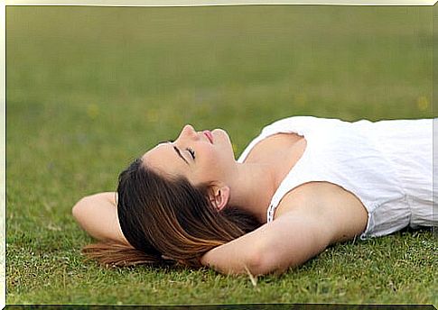 Woman resting on the grass