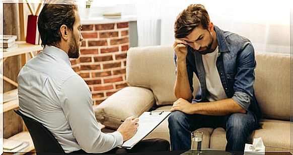 Psychologist talking to his patient while applying TREC