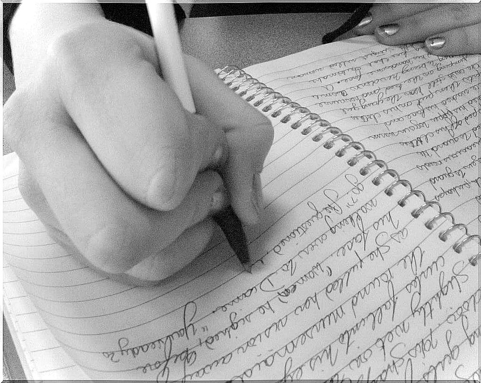 Woman writing for a graphology study