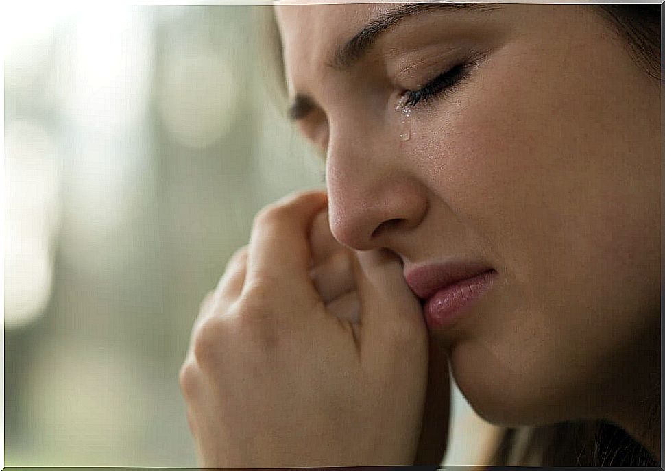 Woman crying in fear