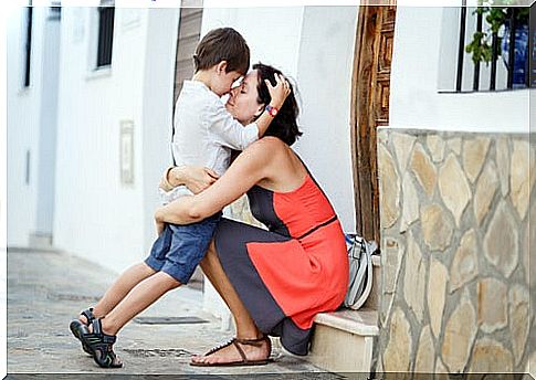 Mother hugging her son conveying her support