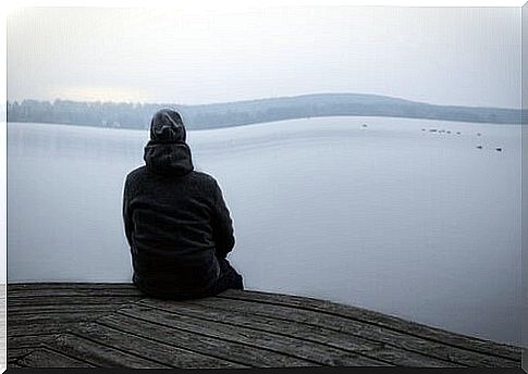 Boy in front of the sea