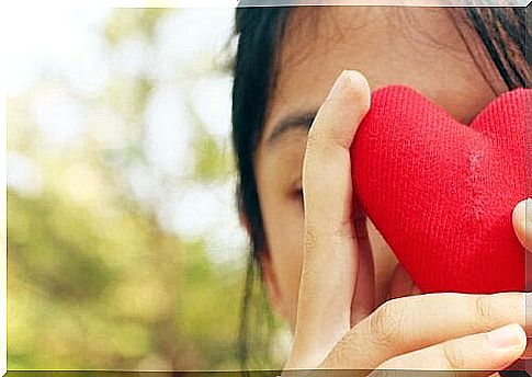 Girl holding a heart