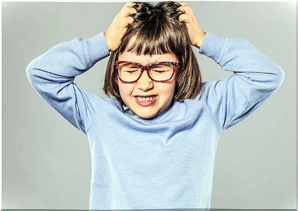 Girl pulling her hair