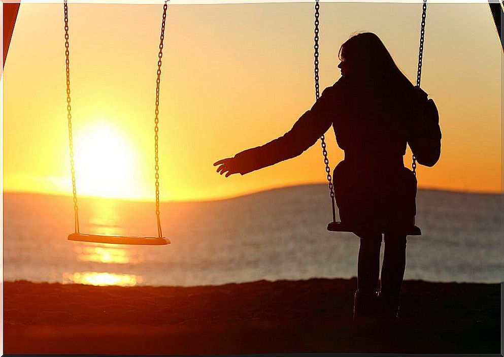 Woman on swing waiting for someone